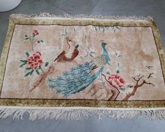 Hand made peacock rug