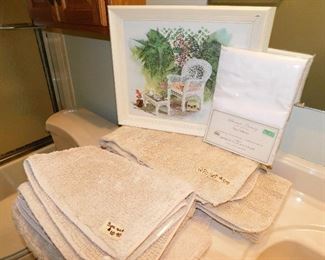 3 piece tan bathroom set (laundered) $10                            Set of 2 small tan bathroom rugs (laundered) $8.00      Tea on the porch print $10                                                               New shower curtain $6.00 SOLD.   