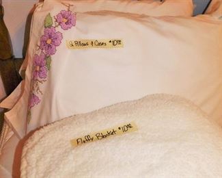 Big fluffy blanket $10.  Two pillows and pillow cases $10.