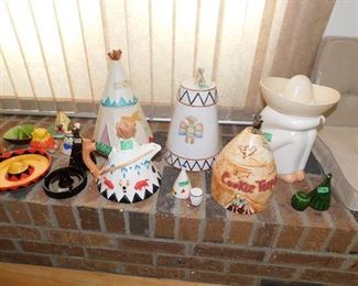 Tall tepee cookie jar 1950s Abingdon $24                   Tepee  cookie jar Made in Portugal $8                             Man with sombrero cookie jar $20      Tea pot $6      Vintage Cookie Tepee by Fred Roberts Co made in Japan $24 T    Teepee/drum Salt & Peppers $5 each Smaller items to the left $3-$5 each