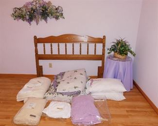 Queen headboard $50      Swag $5       Skirted table $6                    Basket of greenery $3    White queen bedskirt $10.        3 pillow covers $3.       6 pillow covers $6.                                                                Cream Egyptian cotton blanket $10.                                                                                       Queen bedspread, two pillows and shams $12.                                                    Lavender Egyptian cotton blanket (some fading) $8.                                         