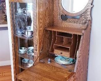 $250 ob.o GORGEOUS ANTIQUE SECRETARY DESK/ CURIO CABINET
HAND CARVED, BEVELVED MIRROR
DIMENSIONS 38WX 77H X14 D