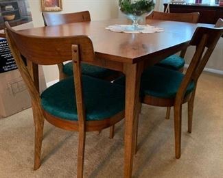 Mid Century Table & Chairs $600 **pic 1 (without leaves)** Great shape, solid. Table and chairs have small inlaid design. Table has two leaves and comes with fabric table pad to go under table cloth. 78L 36W 29H with both leaves, 54L without leaves. Chairs have been recovered.