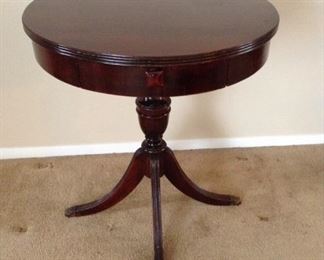 Brandt Furniture Mahogany Single Drawer Drum Table $175 **Pic 1** Measures 24"d and 27"h, has claw feet and one drawer.