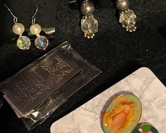 Bookmark "For With God All Things Are Possible" $3, Pair of Religious Tie Tack Pins Guardian Angel/Rose with Mini Cross $4, Pierced Earrings Crystal with Black Faux Pearl $6, Pierced Earrings Crystal with Faux White Pearl $4, Money Clip $10