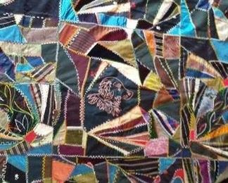 $350       63/63  inches square.  Crazy quilt made of Satin, Corduroy, velvet.  Richly decorated with colored thread; done by hand.  Very colorful.   
