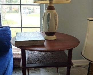 This is France and daverkosen 1950s. Very rare round side table with square shelf. Solid teak $500