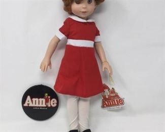 14'' Annie Doll w/ Button https://ctbids.com/#!/description/share/372260