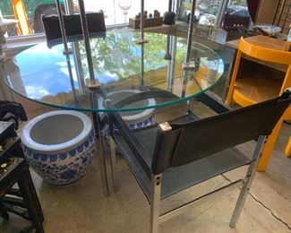 Round glass/chrome dining set (48" w x 48" d x 27" h) - New Price $250 ***Please note:  California sales tax will be charged on all purchases unless you have a valid California resale certificate on file with us.***
