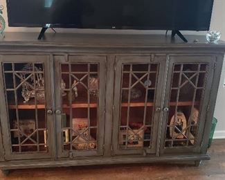 distressed modern cabinet / flat top/wooden inside shelves / wooden/glass doors $425