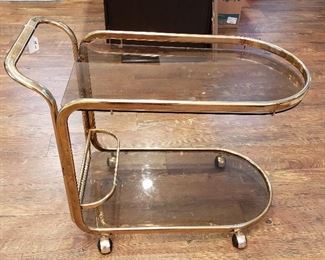 brass and glass mid century cart  34" x 17" x 30"  $75.