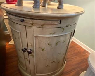 Lot201. Round wooden side table 28” x 26” with shelves and cabinets $225 hand-painted NOW $100