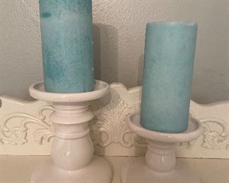 Lot 213 pair of white ceramic candle sticks with blue candles 1 foot and 10 foot. $15 NOW $10