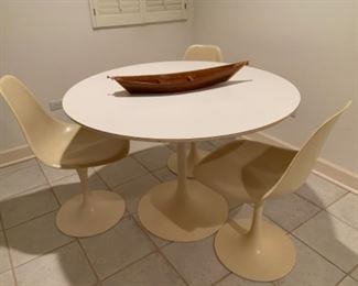 Burke tulip table w/3 chairs $500
