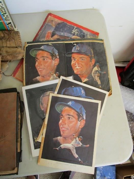 memorabiliaFantastic lot created by the ultimate lifetime collector. Three albums packed full of newspaper clipping and trading sheets from the team members.&nbsp;
Several Season books
2 Dodger Stadium Seats
Mitts and Balls
Electronic baseball game (not complete)