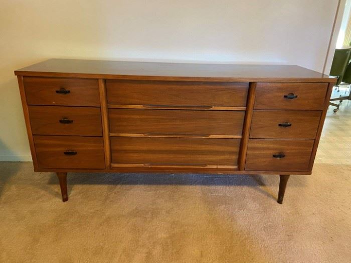 Mid-Century Modern Walnut Triple Dresser by Ward. Made with materials: Walnut, Veneer, Laminate. Dovetail Drawers.