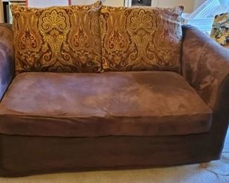 Two Seater Couch with Tapestry Pillow Covers and Ultra Suede Slipcover. Striped Green and White Originally.