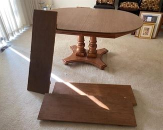 Beautiful Pedestal Base Dining Table with Three Extensions