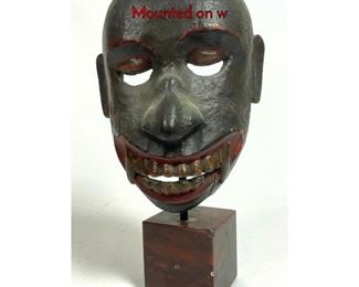 Lot 23 Carved Wood Mask Attributed to Dan Tribe. Mounted on w