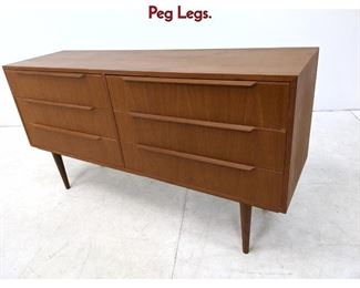 Lot 330 Danish Modern Low Chest Dresser on Peg Legs.