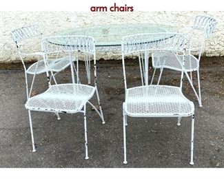 Lot 405 Salterini Iron Patio Set. Glass top table 2 arm chairs