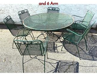 Lot 409 Salterini Style Iron Patio Set. Round Table and 6 Arm