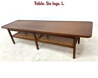 Lot 420 Long American Modern Walnut Cocktail Table. Six legs. L