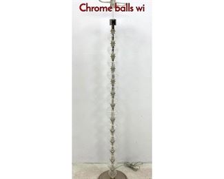 Lot 476 Decorator Chrome and Glass Floor Lamp. Chrome balls wi