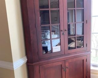 Maple Amish corner cabinet with cherry finish