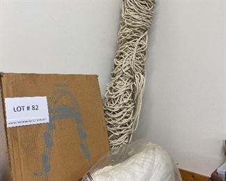 hanging hammock with pillow and pool ladder