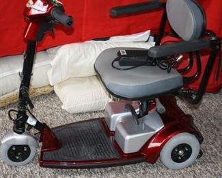 #18 Strider Electric Scooter Chair.   Needs Charger unit.  On order.                                                    