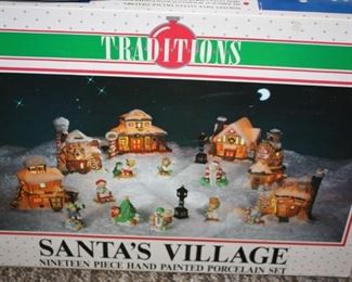 #63a.    Traditions 19 Piece Santa's Village Hand painted Porcelain set                                                                                                  
