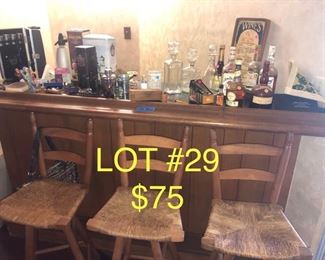 lot No. 29 Includes three vintage barstools, multiple vintage bottles, as well as other bar items
