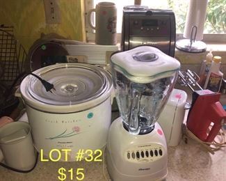 Lot no 32 includes glass blender mixer toaster coffee maker and crockpot plus other items