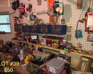 Lot no. 39 includes all items pictured from tools, 22 holders, mini air compressor, tons of useful  garage stuff!