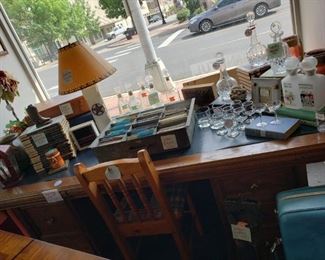 Large Vintage Desk-$250
Red Lantern-$12
Book Set-$25
Candle-$5
Austin Stone Lamp-$45
Vintage Briefcase-$20
Vintage Postcards-$2 each
Decanters in center-$10 each
Wild Turkey Glades-$8 pair
Set if 6 liquor glasses-$8
Set of 2 liquor glasses-$4
Crown Royal Glades-$8 pair
Gin/Scotch Set-$25
Waterford Decanter-$125
Crystal Decanters-$40 each
Vintage Fireplace Set$40
Chair-$15