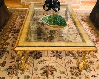 Glass top/ gold base coffee table priced @ $245.00 54 inches long x 36 inches wide x 21 inches tall