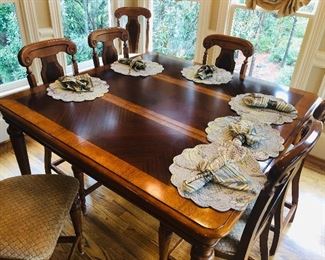 60" square table with 20" leaf insert, 8 chairs with an 18" deep seat and 24" floor to seat & 46" floor to top.