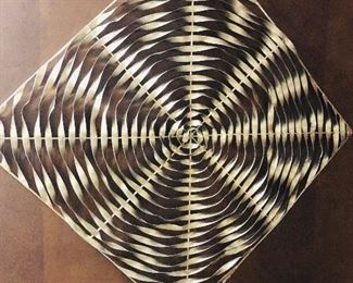 Metal wall art $34.00 measuring 20 inches square