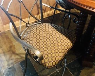SET of 4 Iron swivel bar height chairs @ $400
