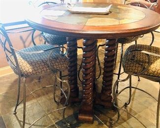 Barley twist slate top pub table only $425.00. Iron chairs priced separately at $100.00 each.