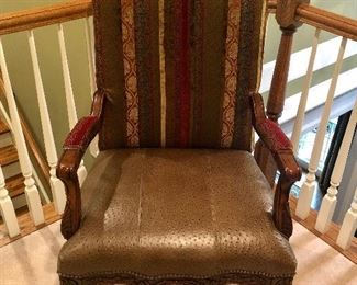 Single Fairfield arm chair with brown ostrich seat, fabric cushioned back and wood accents priced @ $474