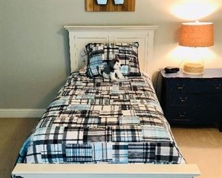 Gorgeous white twin size bed including headboard, footboard, 2015 mattress & box spring $399.00 each (2 available). Linens sold separately.