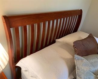 Queen bed, DOES NOT includes mattress and box springs, $150
Bedding, $55