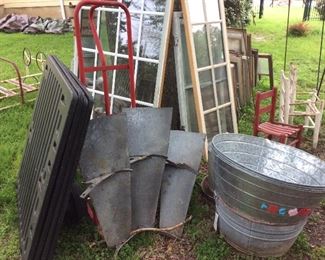 Four planter barrels $30; Windmill blades$100