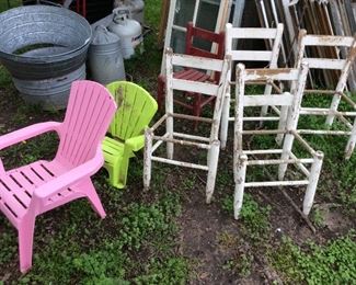 Four antique white children’s chairs: $40; red chair $10; pink plastic chair: $5; green plastic chair: $2