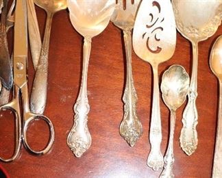 silver plate serving pieces in this photo $4 each