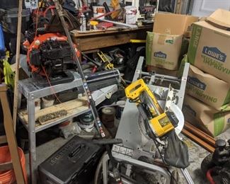 DEWALT RADIAL SAW WITH STAND- $250.-------ZOOM IN AND GET SOME GOOD LOOKS,  LOTS OF TREASURES MAY BE BURIED. hand tools: lg $8, med $4, sm $2. Power  (corded or battery) $22 (UNLESS PICTURE SPECIFICALLY STATES OTHERWISE!!) Jumper cables--$12 each