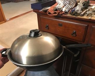pot with lid. almost wok like $10