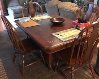 dining table (rough dimensions, in inches, 42l x 60w x 30h) $250. four chairs, matching, one with captain's arms. 22" wide and 41.75" tall. $250 for chairs. $450 for combo set. also have matching buffet.